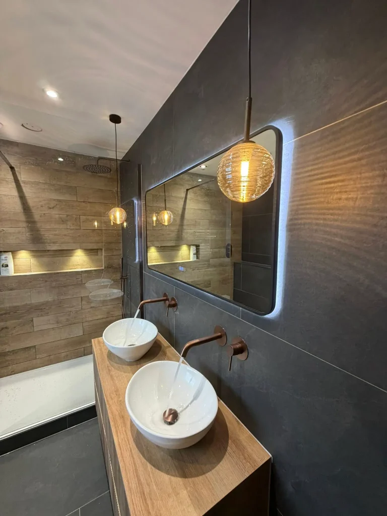 dule sink basin and ornate taps fitted with mirror and backlight